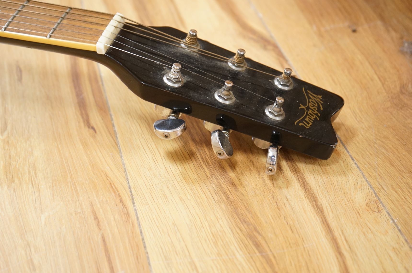 A Washburn festival series, 10mb electric-acoustic guitar